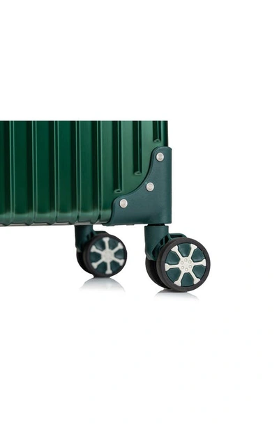 Shop Champs Aluminum Hardside Spinner Suitcase In Green