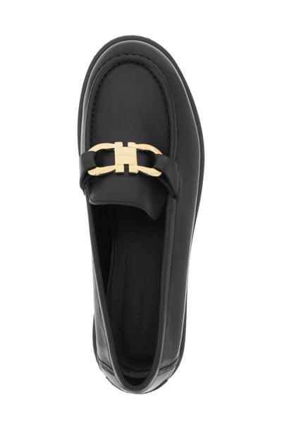 Shop Ferragamo Gancini Buckle Loafers In Black