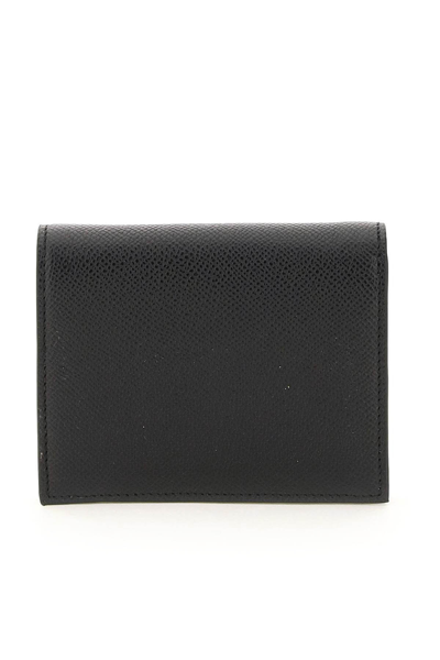 Shop Ferragamo Gancini Bifold Wallet In Black