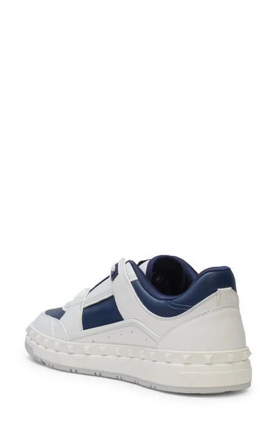 Shop Valentino Rockstud Low Top Sneaker In Fc6 - Bianco/ Worker