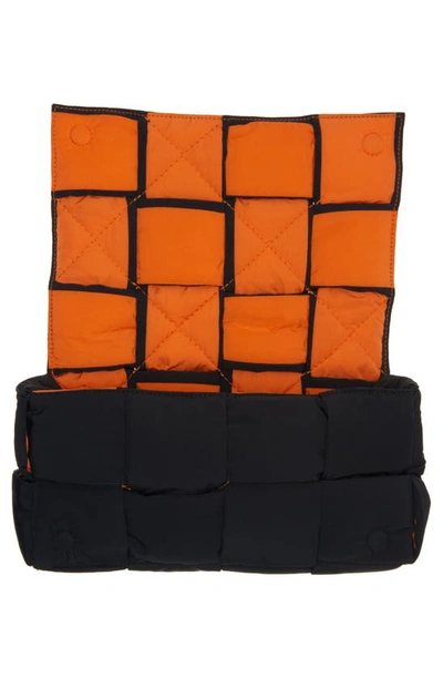 Bottega Veneta Padded Tech Cassette Messenger Bag In 1001 Black/ Papaya