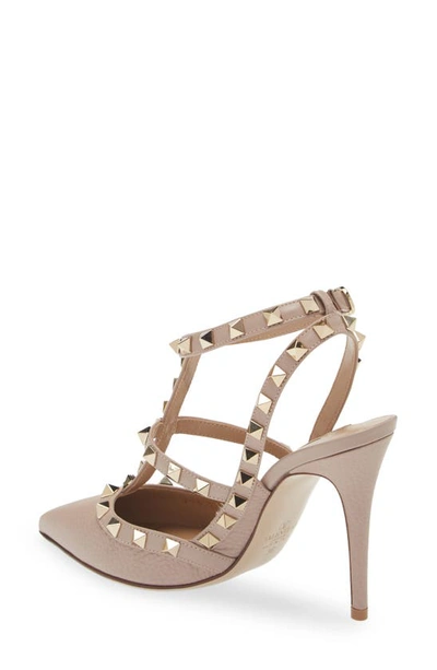 Shop Valentino Rockstud T-strap Pointed Toe Pump In Poudre