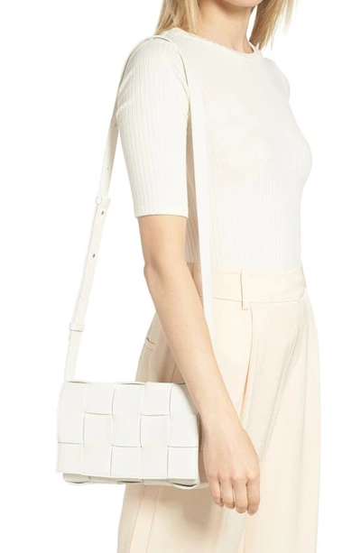 Shop Bottega Veneta Intrecciato Leather Crossbody Bag In White/ Silver