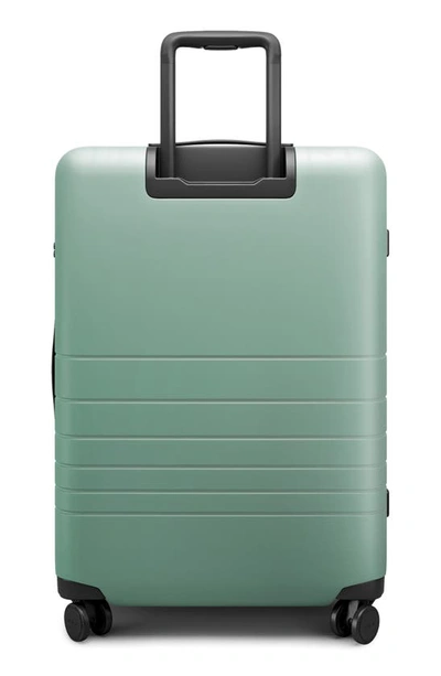 Shop Monos 23-inch Carry-on Plus Spinner Luggage In Sage Green