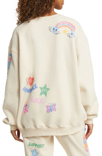 Shop The Mayfair Group Angels All Around You Graphic Sweatshirt In White