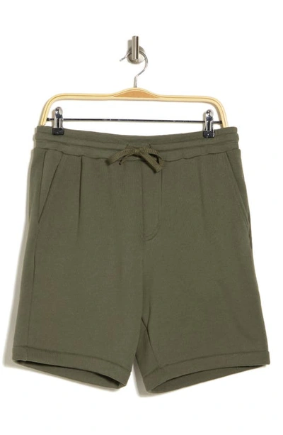 Shop Bella+canvas Drawstring Sweat Shorts In Military Green