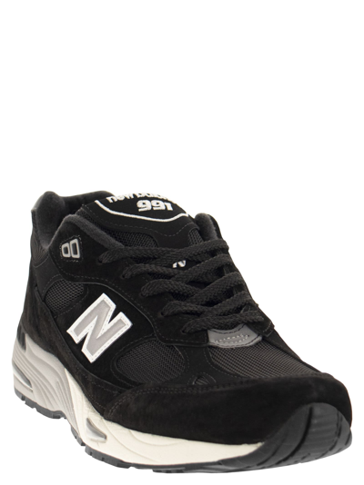Shop New Balance 991 Sneakers