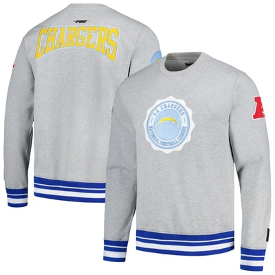 Shop Pro Standard Heather Gray Los Angeles Chargers Crest Emblem Pullover Sweatshirt