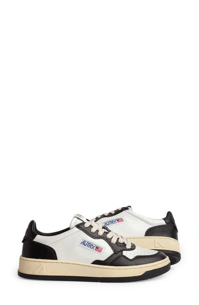 Shop Autry Medalist Low Sneaker In White/ Black