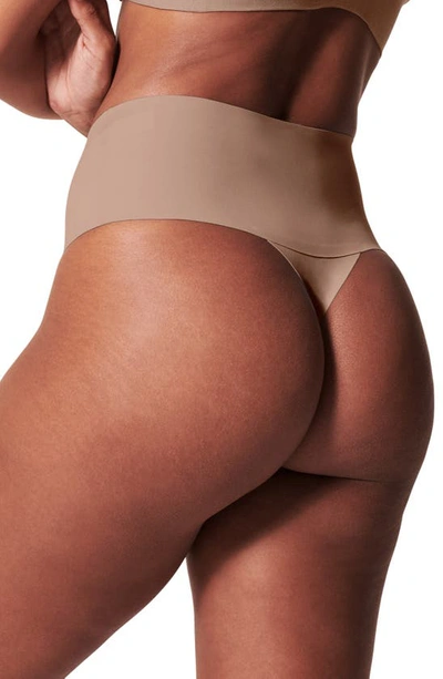 Shop Spanx Undie-tectable Thong In Cafe Au Lait