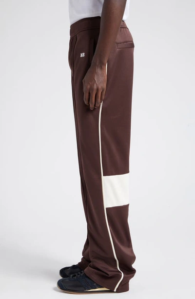 Shop Wales Bonner Kola Embroidered Logo Track Pants In Brown And Ivory