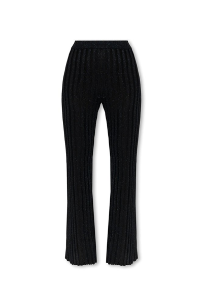 Shop Stella Mccartney Ribbed Pleated Trousers In Black