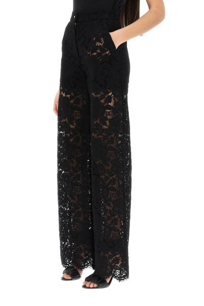 Shop Dolce & Gabbana Flared-leg Lace Pants Women In Black