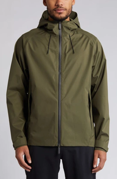 Shop Zella Commuter Waterproof Hooded Jacket In Olive Night