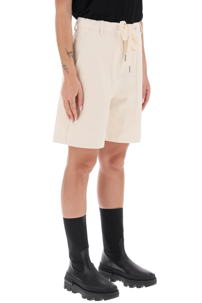 Shop Moncler Cotton Drill Shorts Women In Cream