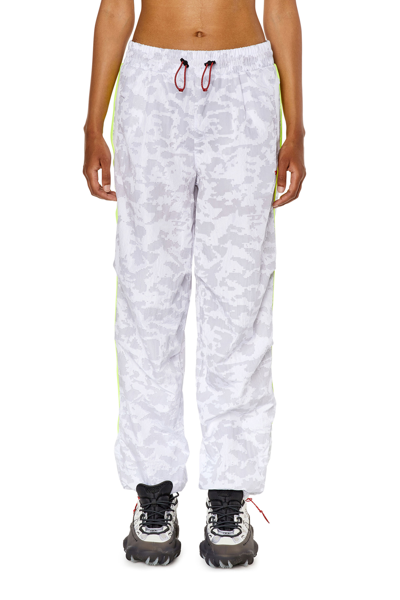 Shop Diesel Track Pants With Pixelated Print In Multicolor