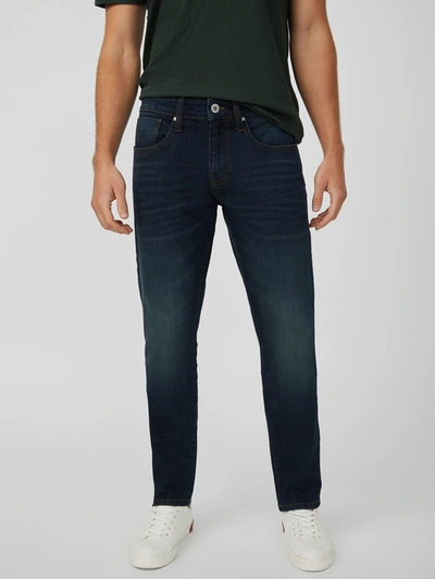 Shop Guess Factory Halsted Tapered Slim Jeans In Blue