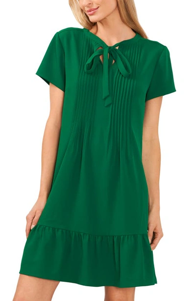 Shop Cece Pintuck Tie Neck Ruffle Hem Dress In Green
