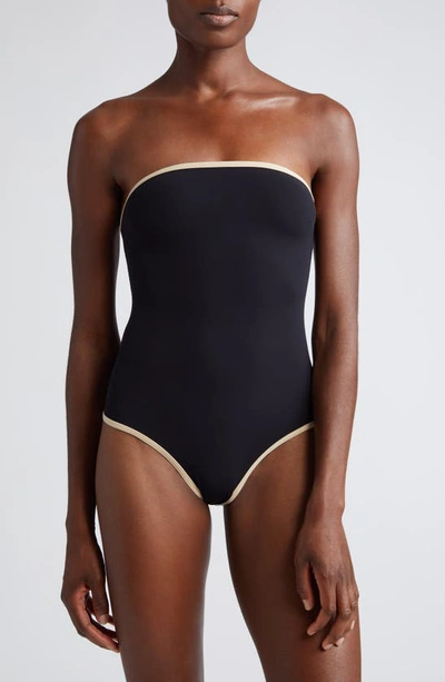 Shop Totême Stripe Edge Strapless One-piece Swimsuit In Black
