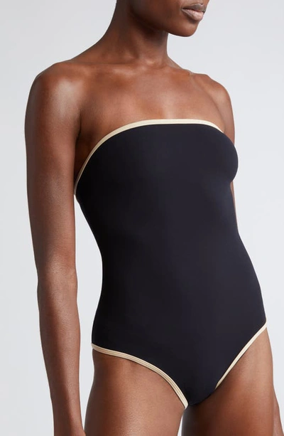 Shop Totême Stripe Edge Strapless One-piece Swimsuit In Black