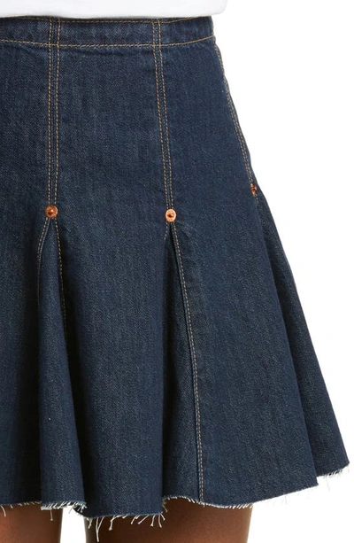 Shop Re/done Raw Hem Denim Flounce Miniskirt In Tinty Rinse