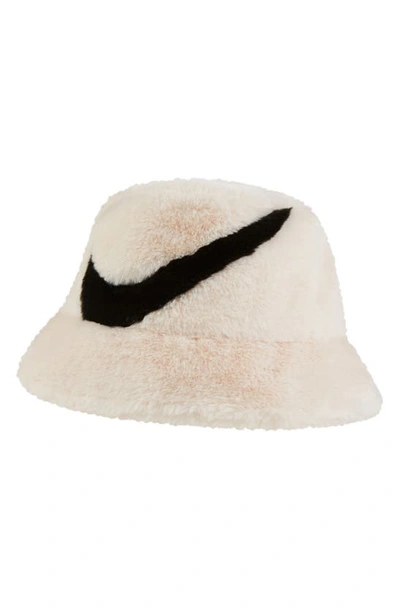 Shop Nike Apex Swoosh Faux Fur Bucket Hat In Guava Ice/ Black