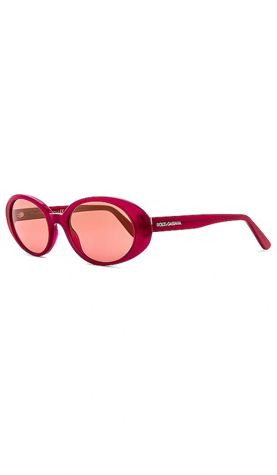 Shop Dolce & Gabbana Oval Sunglasses In Milky Pink