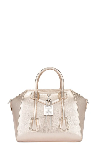 Shop Givenchy Mini Antigona Lock Bag In Dusty Gold
