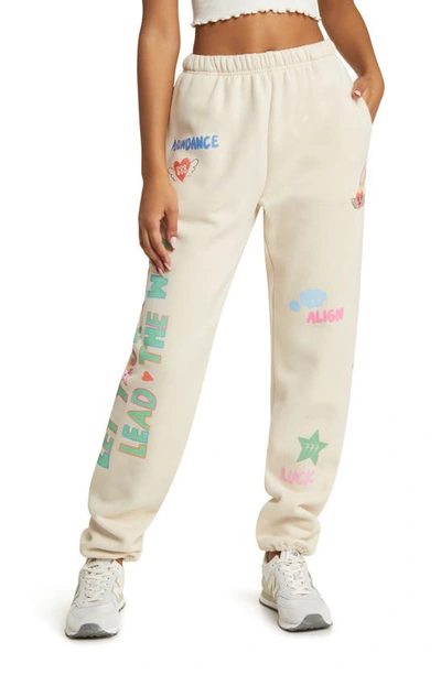 Shop The Mayfair Group Angels All Around You Graphic Joggers In Ivory