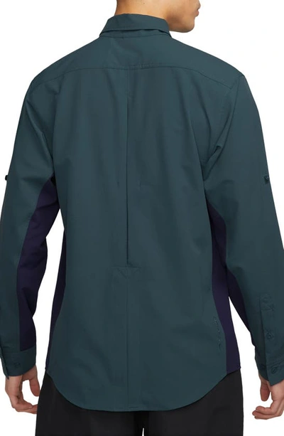 Shop Nike Dri-fit Acg Uv Devastation Performance Button-up Trail Shirt In Deep Jungle/ Purple Ink