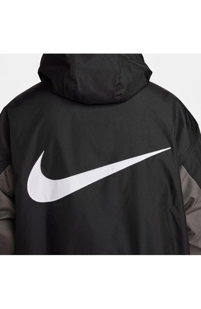 Shop Nike Solo Swoosh Water Repellent Puffer Jacket In Black/ White