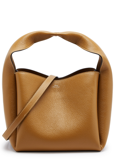 Shop Totême Small Leather Bucket Bag In Camel