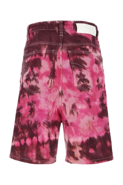 Shop Ami Alexandre Mattiussi Ami Man Printed Denim Bermuda Shorts In Multicolor