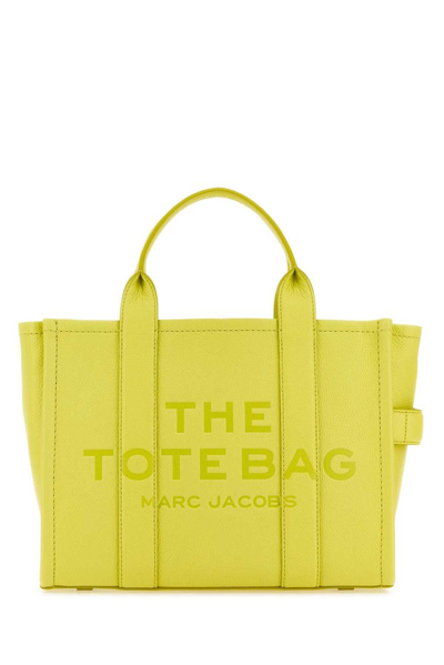 Shop Marc Jacobs Logo Embossed Medium Tote Bag In Yellow