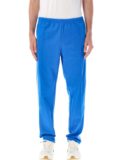 Shop Adidas Originals Beckenbauer Logo Embroidered Striped Track Pants In Blue