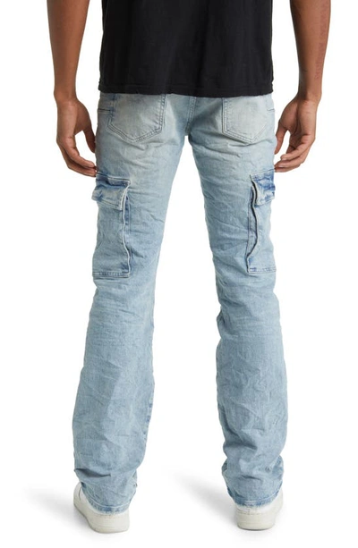 Shop Purple Brand Worn Bootcut Cargo Jeans In Light Indigo