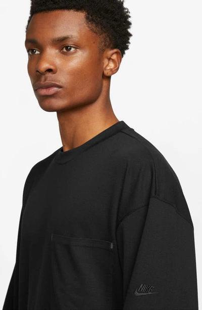 Shop Nike Sportswear Dri-fit Tech Pack Long Sleeve Top In Black/ Black