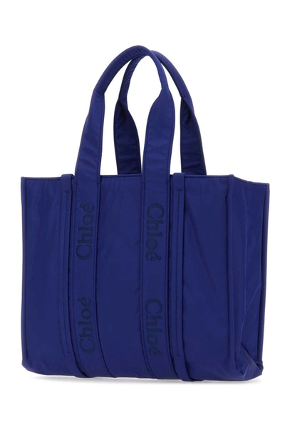 Shop Chloé Handbags. In Blue