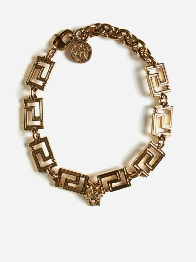 Shop Versace Greca Bracelet In Gold