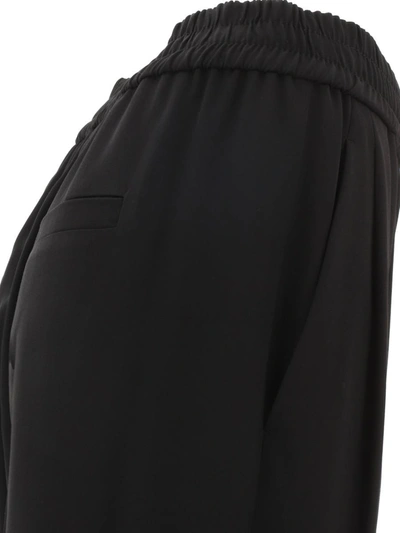 Shop Brunello Cucinelli Wide Trousers With Elasticated Waist In Black