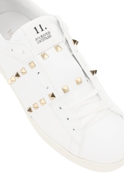 Shop Valentino Open Rockstud Untitled Sneakers In White,gold