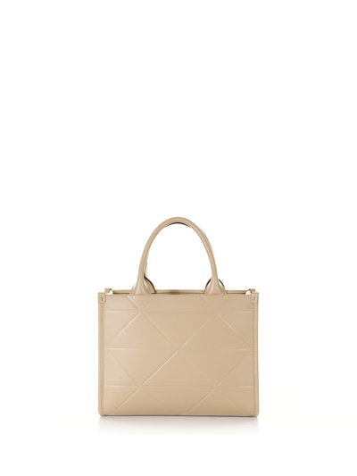 Shop Prada Symbole Mini Leather Bag With Stitching In Sabbia 1