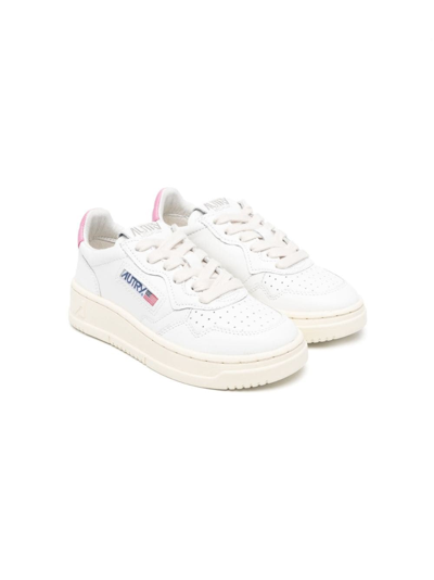 Shop Autry Sneakers In Pelle Bianca In White