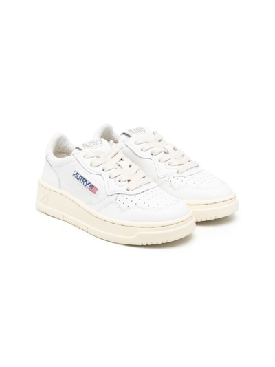 Shop Autry Sneakers In Pelle Bianca In White