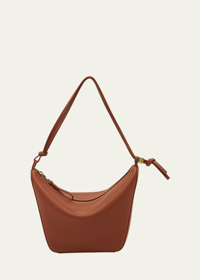 Shop Loewe Hammock Hobo Bag In Leather In Tan