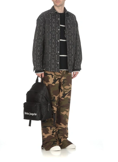 Shop Palm Angels Camouflage Trousers In Black