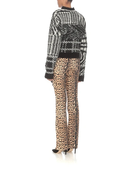 Shop Roberto Cavalli Flared Animalier Trousers In Brown