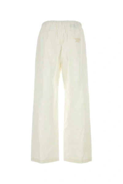 Shop Gucci Pants In White