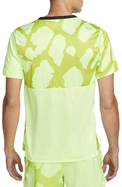 Shop Nike Dri-fit Run Division Rise Running T-shirt In Ghost Green