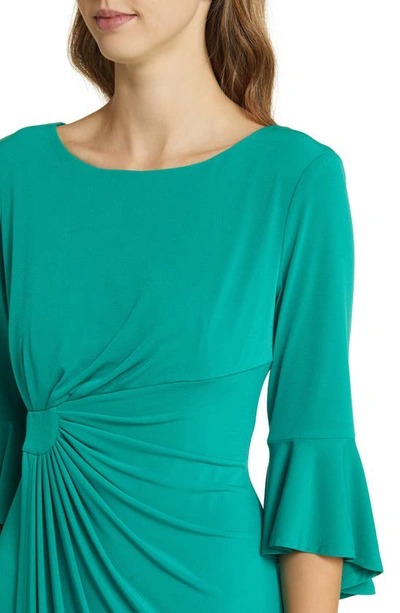 Shop Connected Apparel Ruched Bell Sleeve Faux Wrap Cocktail Dress In Jade
